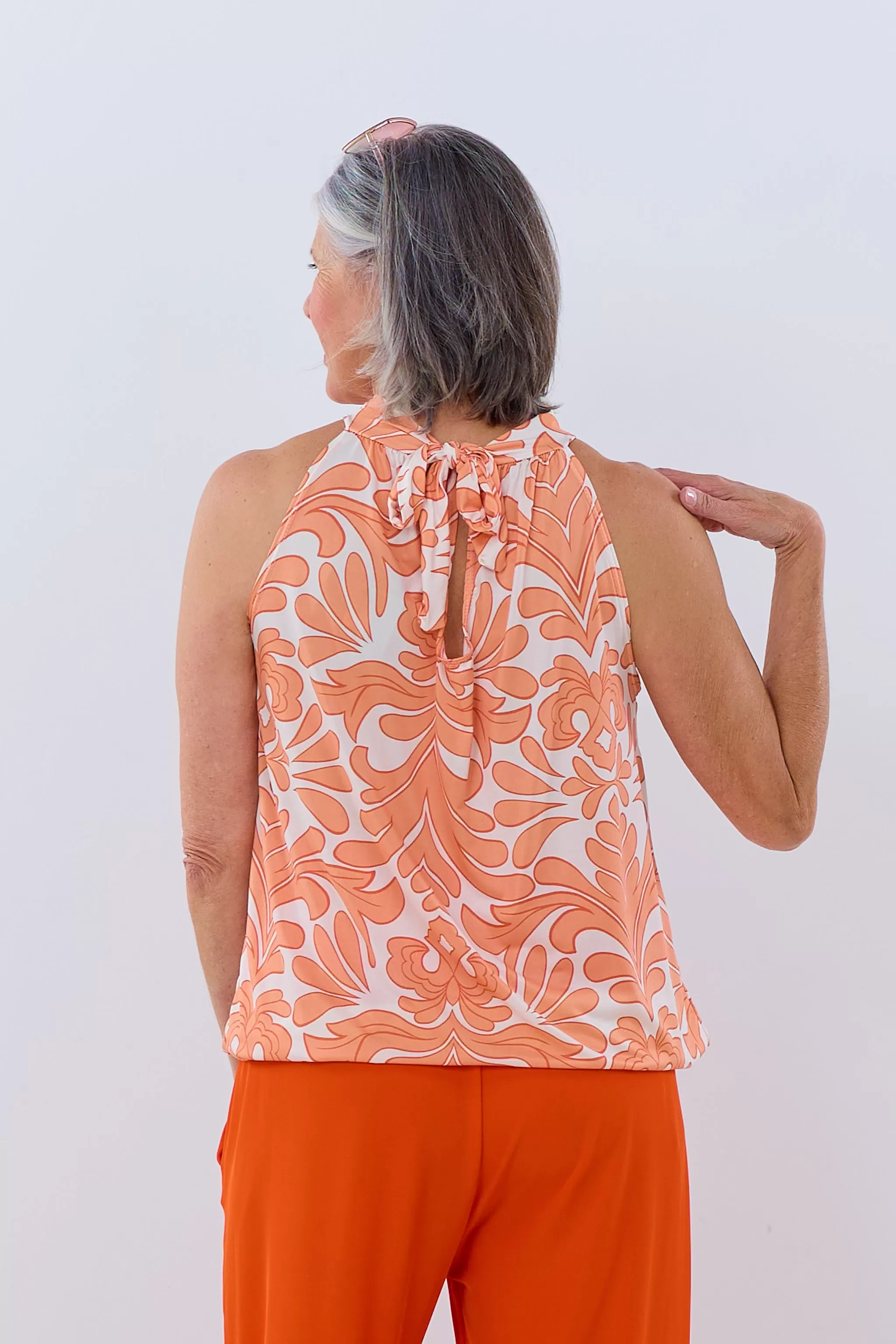 Neckholder Top mit Phantasy-Muster, hellorange-creme